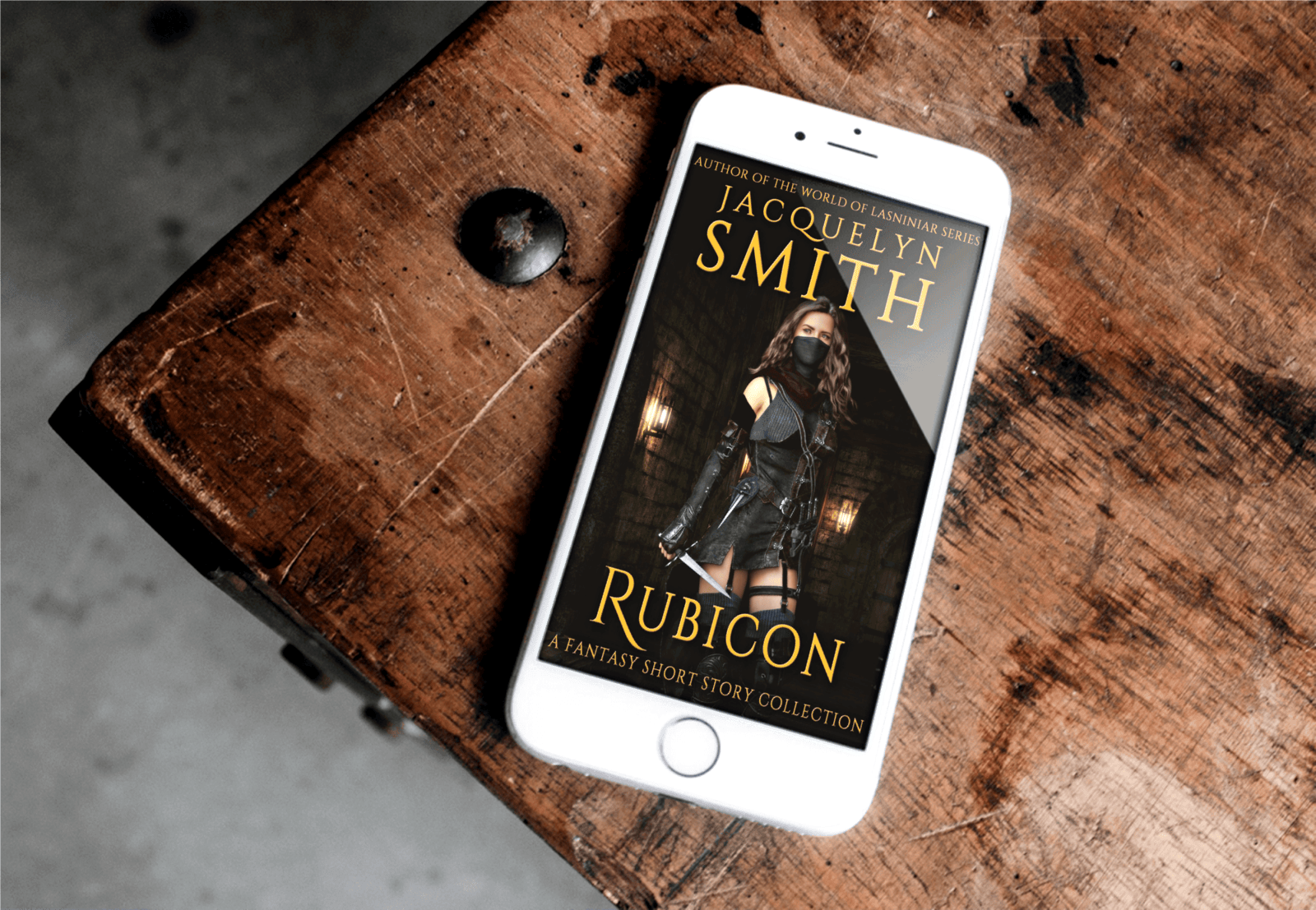 Rubicon a Fantasy Short Story Collection iphone on wooden table